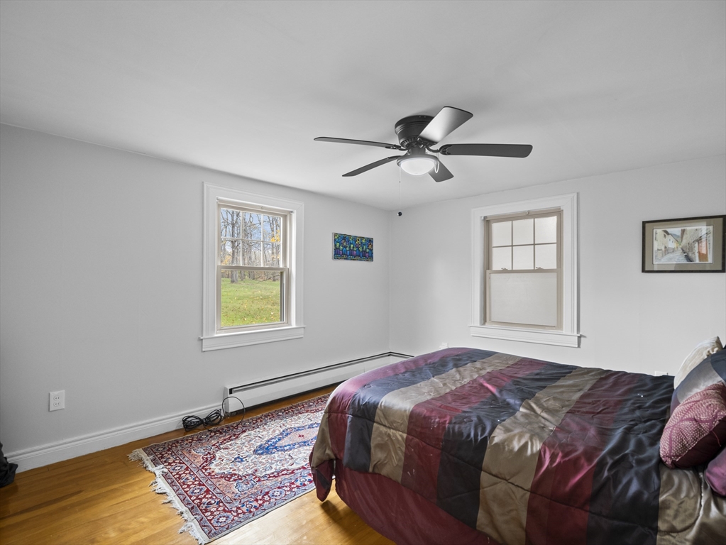 354 Townsend Road Groton, MA 01450 - Photo 31 of 39 a bedroom with a bed and a window