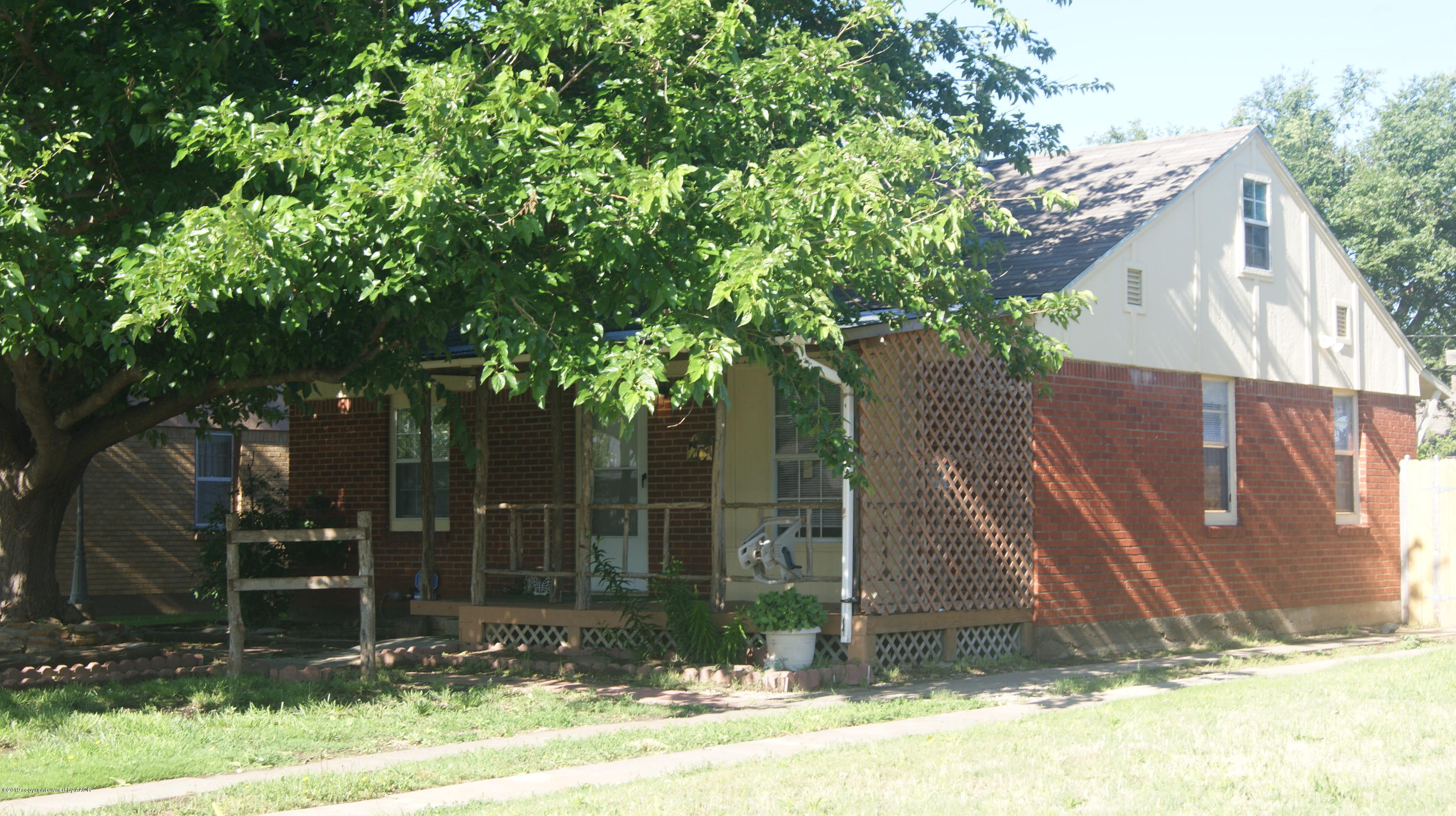 3604 South Ong Street Amarillo, TX 79110 - Photo 3 of 38 a view of a house with a yard