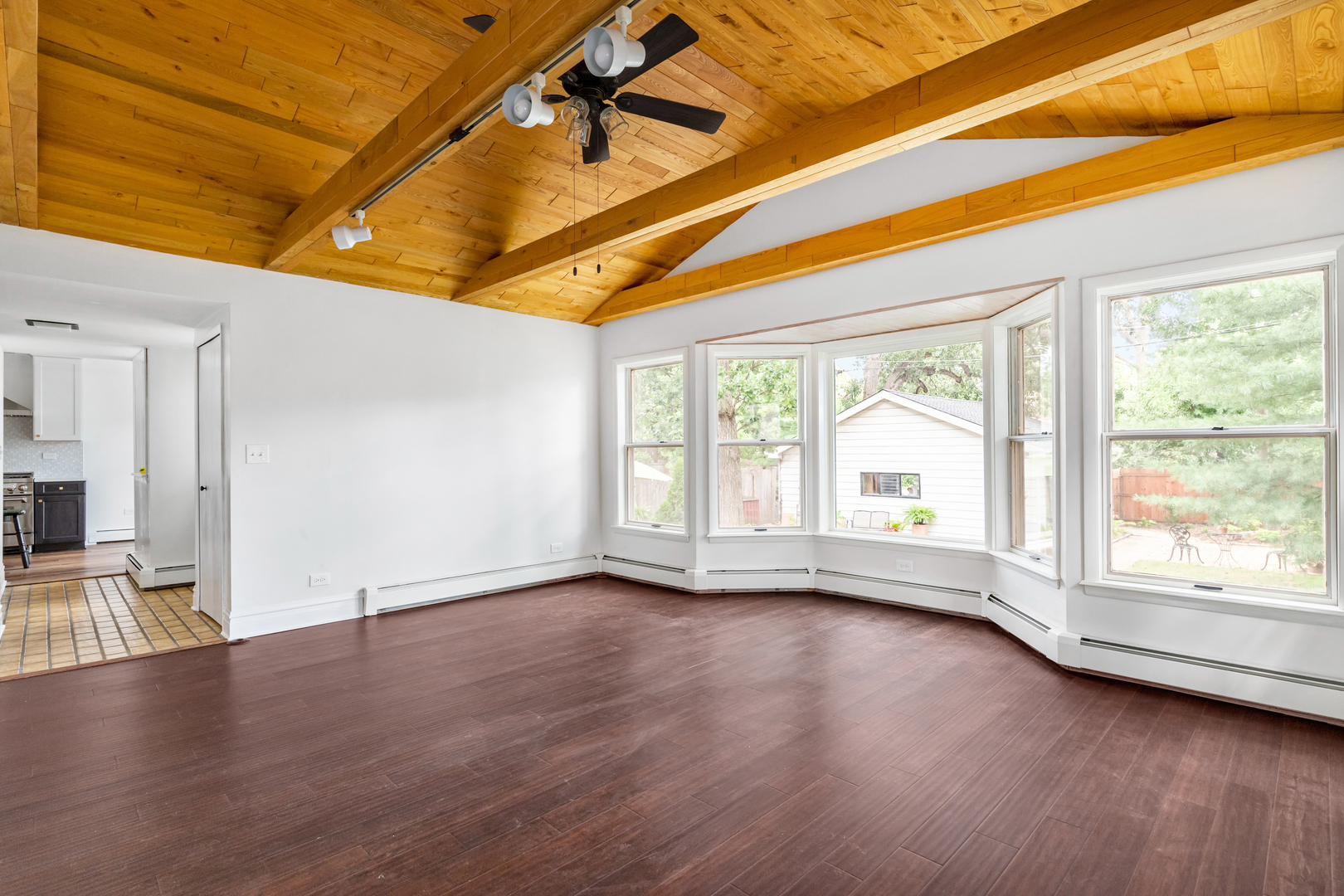 294 Maplewood Road Riverside, IL 60546 - Photo 13 of 31 a view of empty room with wooden floor and fan
