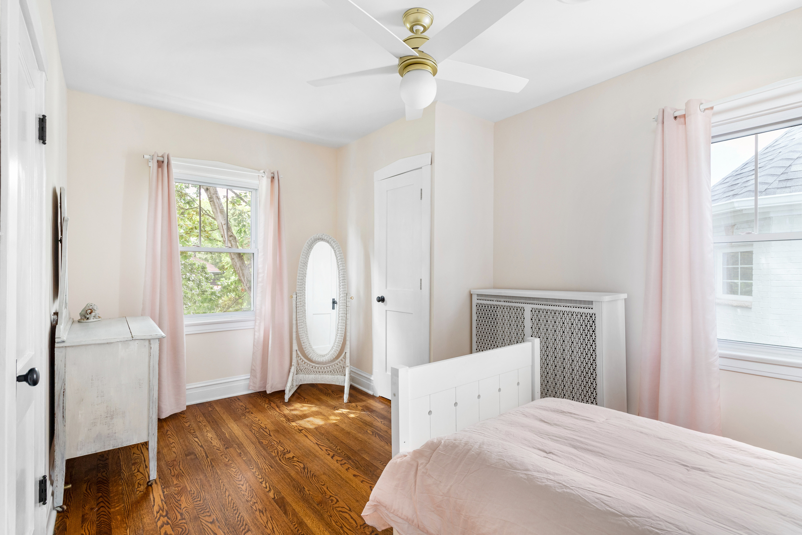 294 Maplewood Road Riverside, IL 60546 - Photo 20 of 31 a bedroom with a bed a window and chandelier