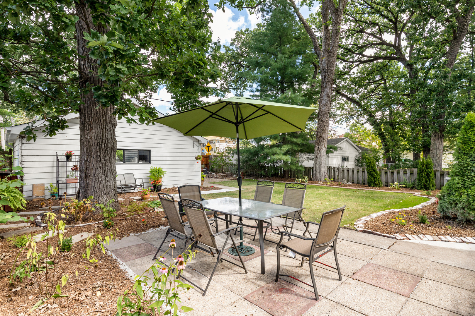 294 Maplewood Road Riverside, IL 60546 - Photo 25 of 31 a view of backyard with swimming pool and patio