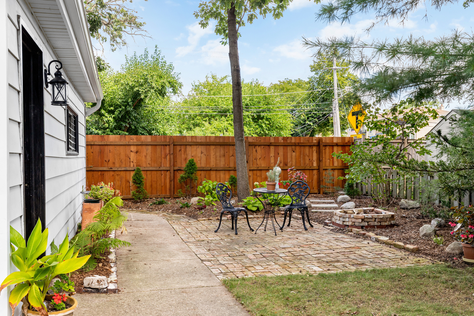 294 Maplewood Road Riverside, IL 60546 - Photo 26 of 31 a view of a chairs and table in the patio