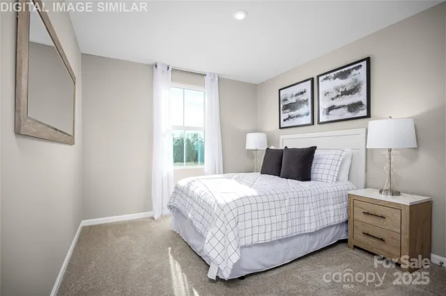 a bedroom with bed and a window