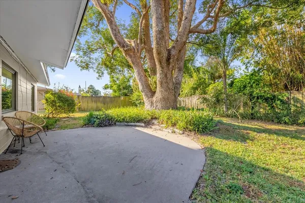 a view of backyard with outdoor space