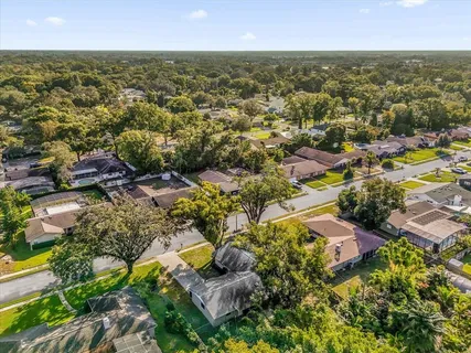 an aerial view of residential house with outdoor space