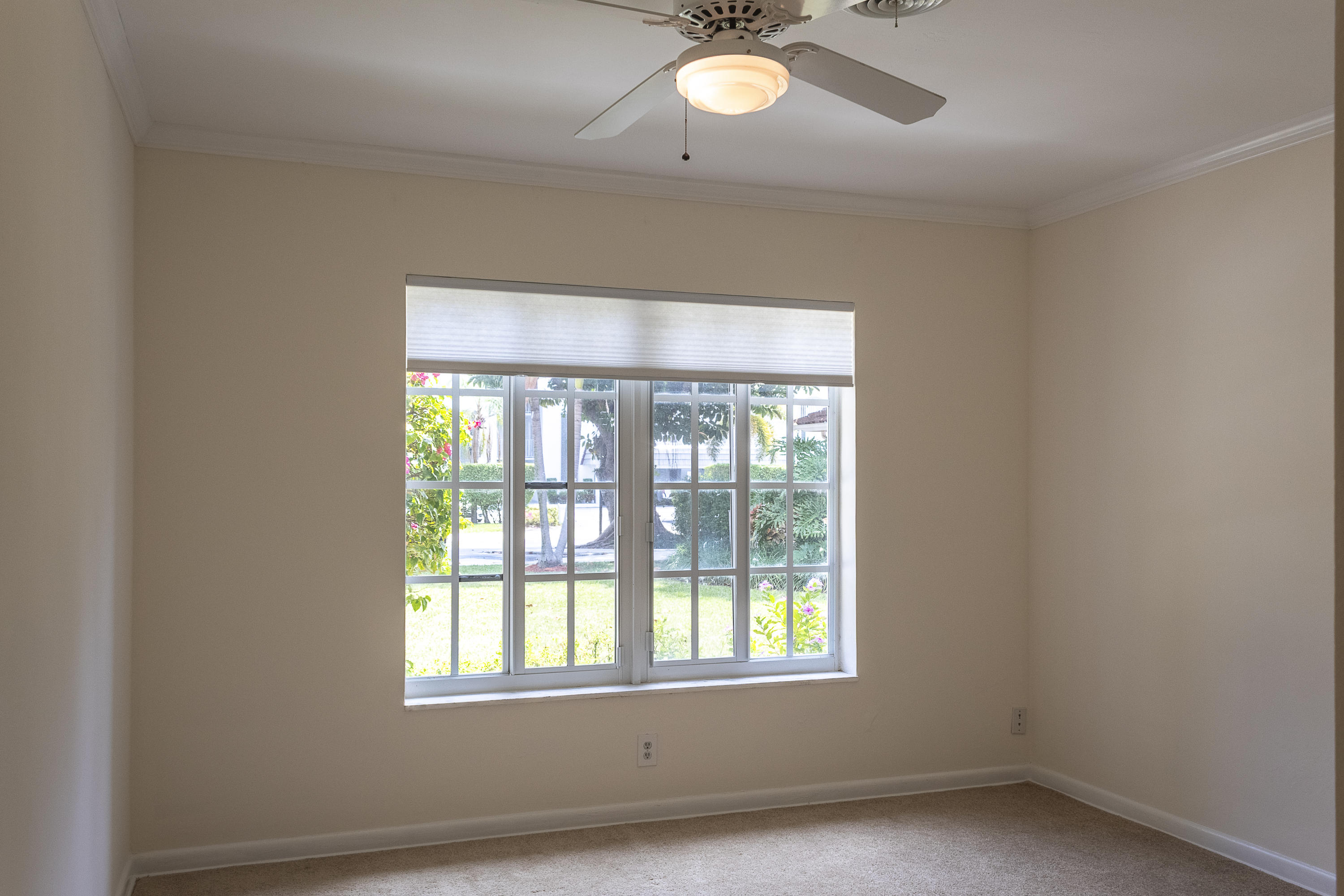 770 East Camino Real, Unit 60 Boca Raton, FL 33432 - Photo 28 of 40 an empty room with a window