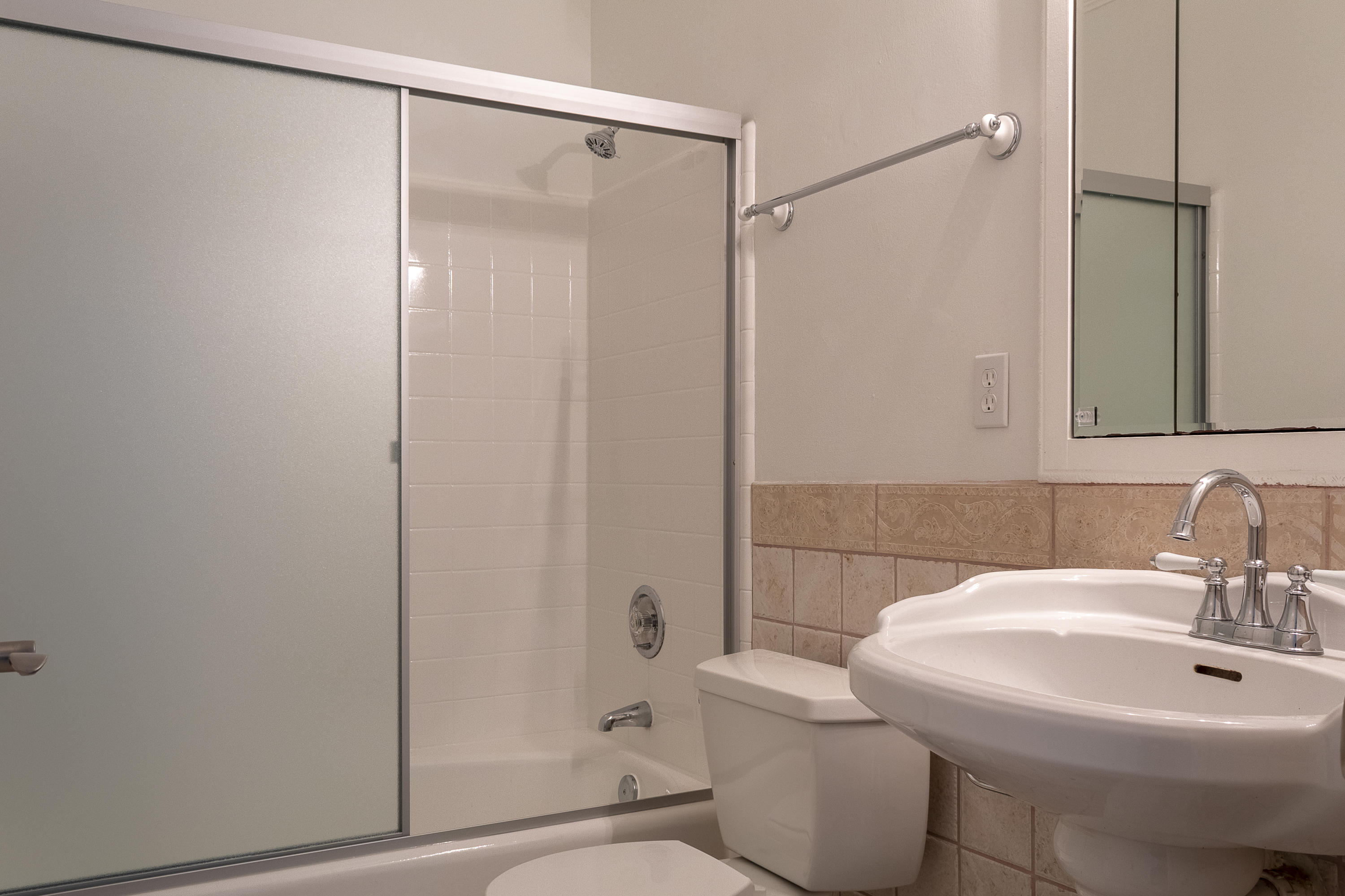 770 East Camino Real, Unit 60 Boca Raton, FL 33432 - Photo 30 of 40 a bathroom with a sink toilet and shower