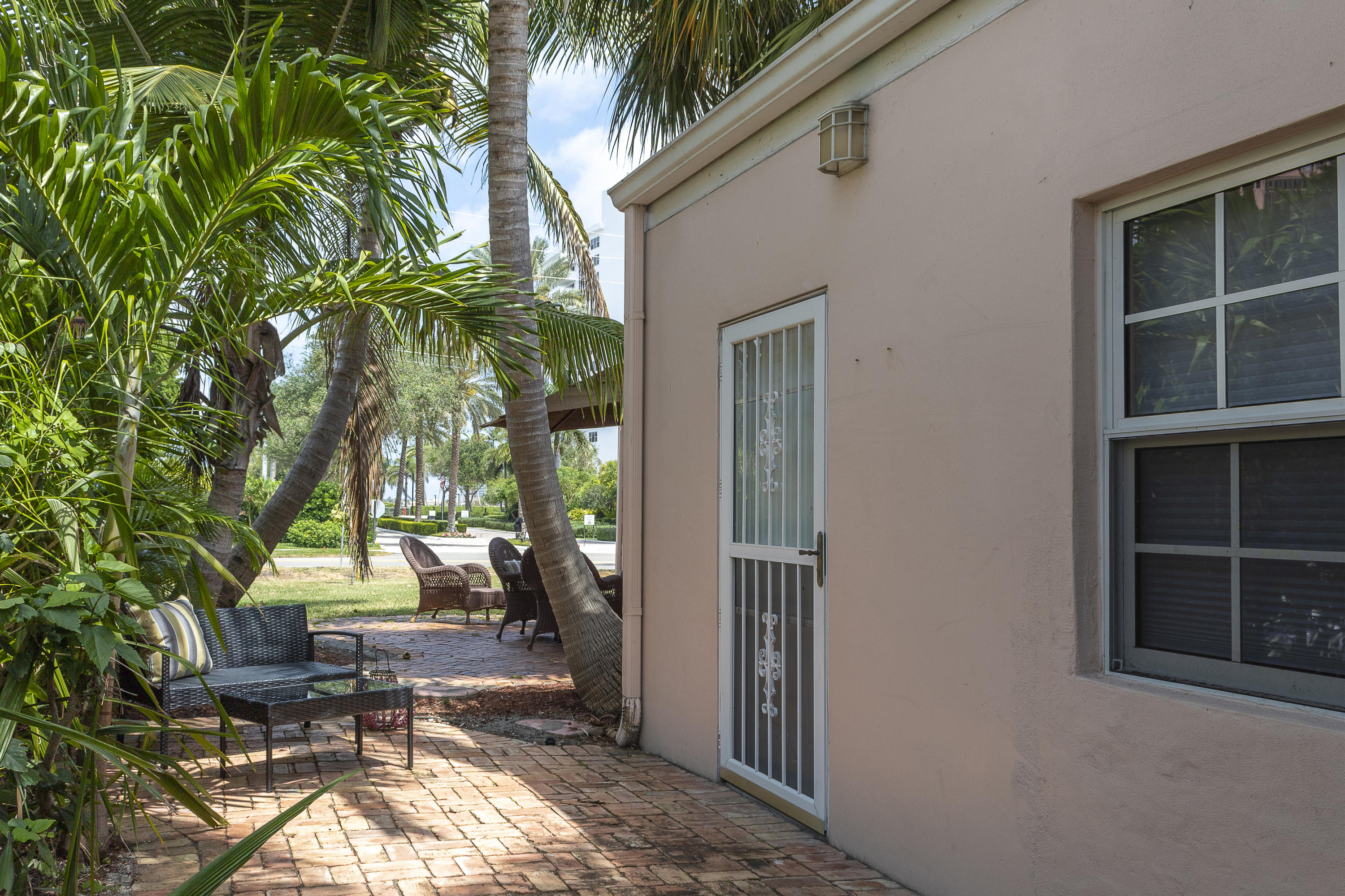770 East Camino Real, Unit 60 Boca Raton, FL 33432 - Photo 31 of 40 a view of a house with a patio