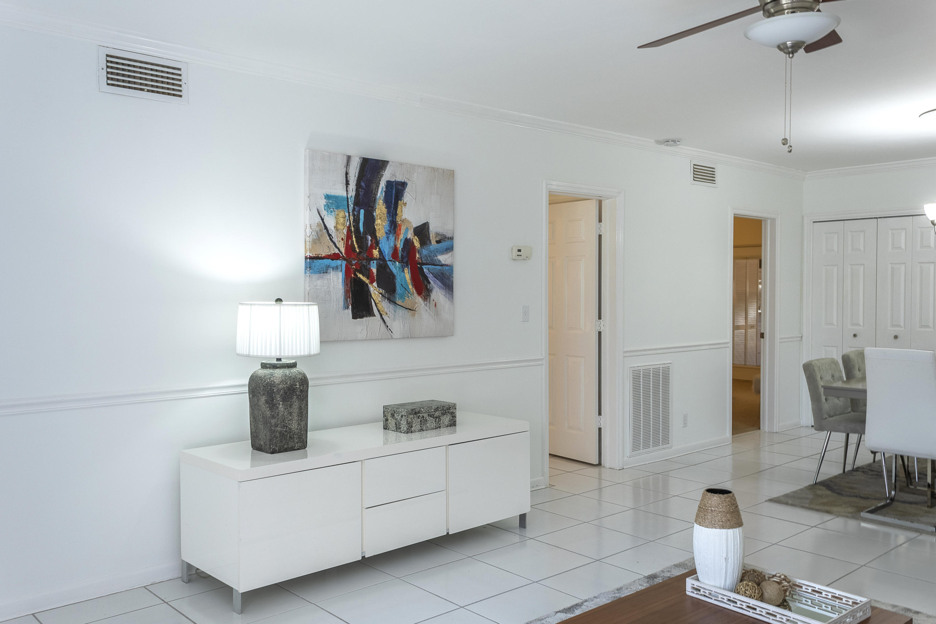 770 East Camino Real, Unit 60 Boca Raton, FL 33432 - Photo 6 of 40 a view of kitchen with furniture and natural light