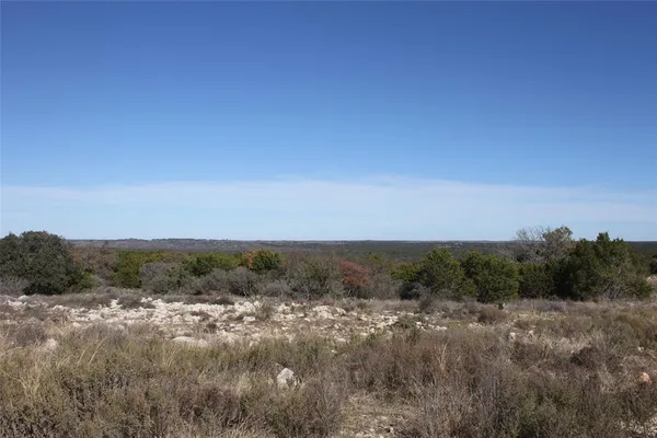 a view of outdoor space and covered with trees