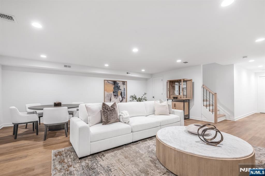 23 Fey Place Oradell, NJ 07649 - Photo 31 of 36 a living room with furniture and a table