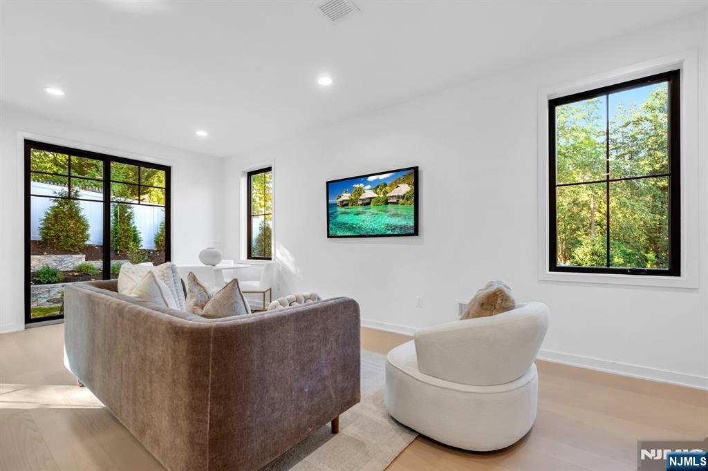 23 Fey Place Oradell, NJ 07649 - Photo 10 of 36 a living room with furniture and a large window