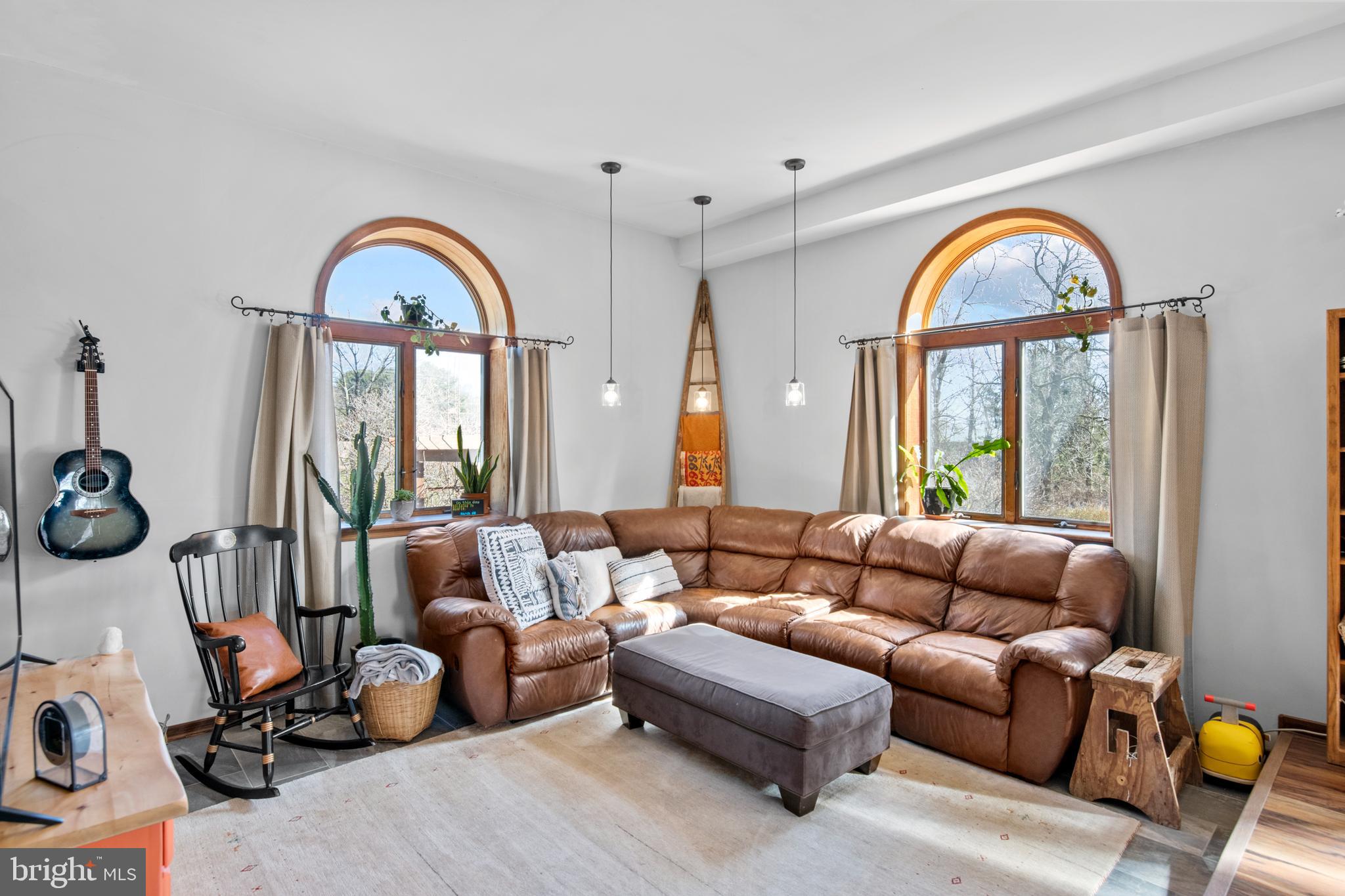 248 Warwick Road Elverson, PA 19520 - Photo 12 of 56 Sunken living room with pendant lights
