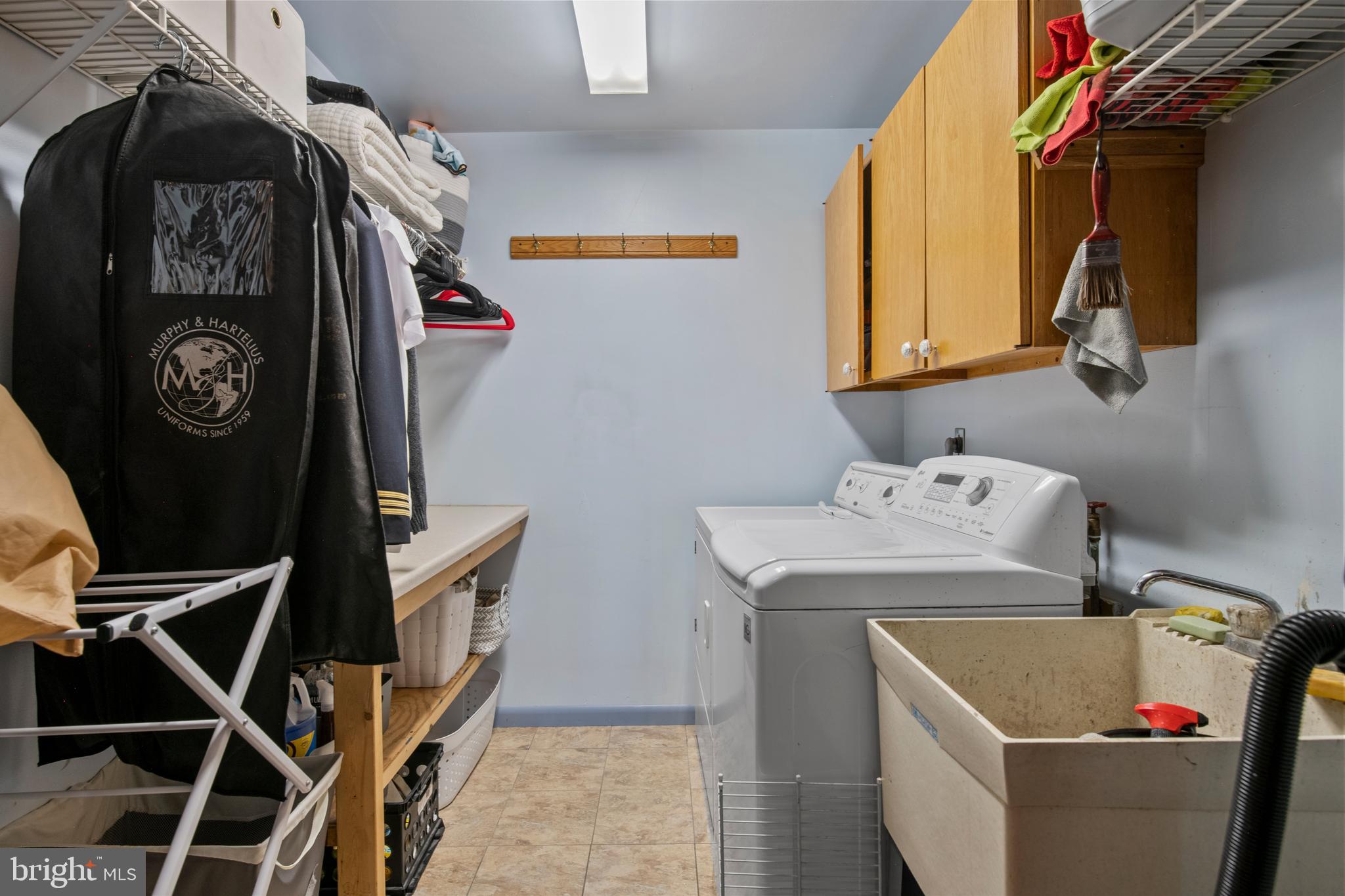 248 Warwick Road Elverson, PA 19520 - Photo 26 of 56 Main level laundry room with wash basin