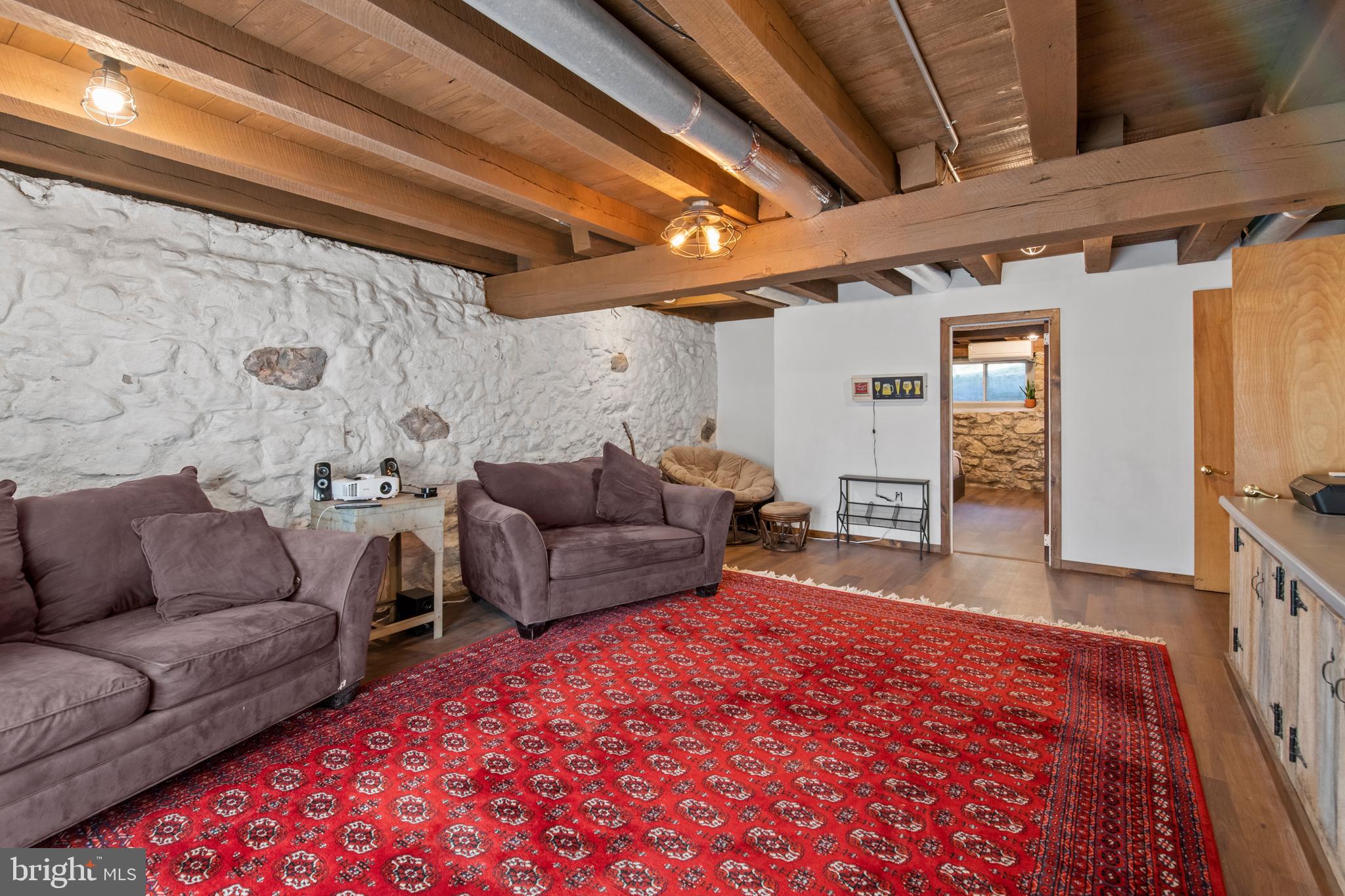 248 Warwick Road Elverson, PA 19520 - Photo 30 of 56 Family room includes vinyl plank flooring