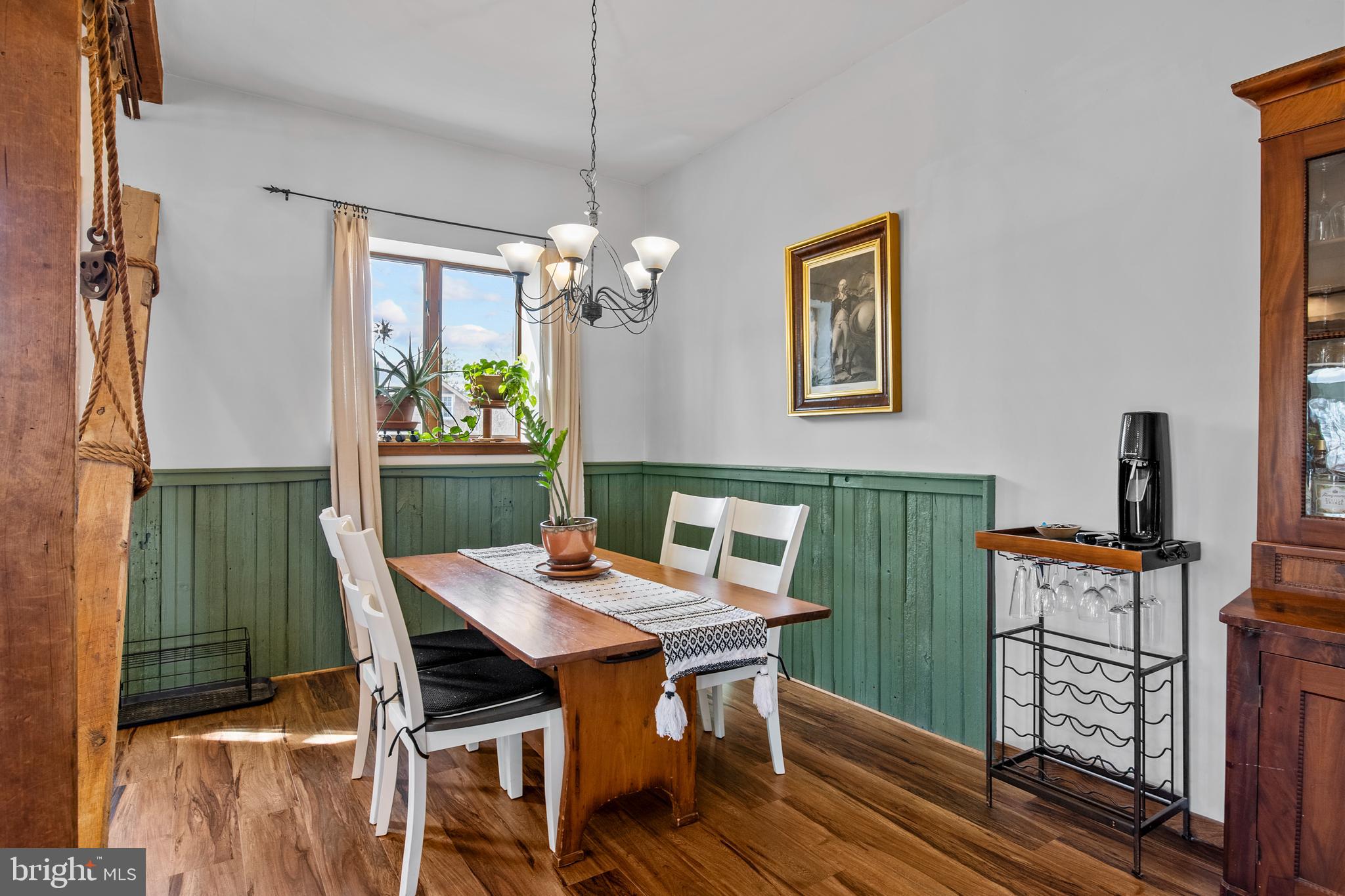 248 Warwick Road Elverson, PA 19520 - Photo 8 of 56 Wainscot wall panels and luxury vinyl plank floors