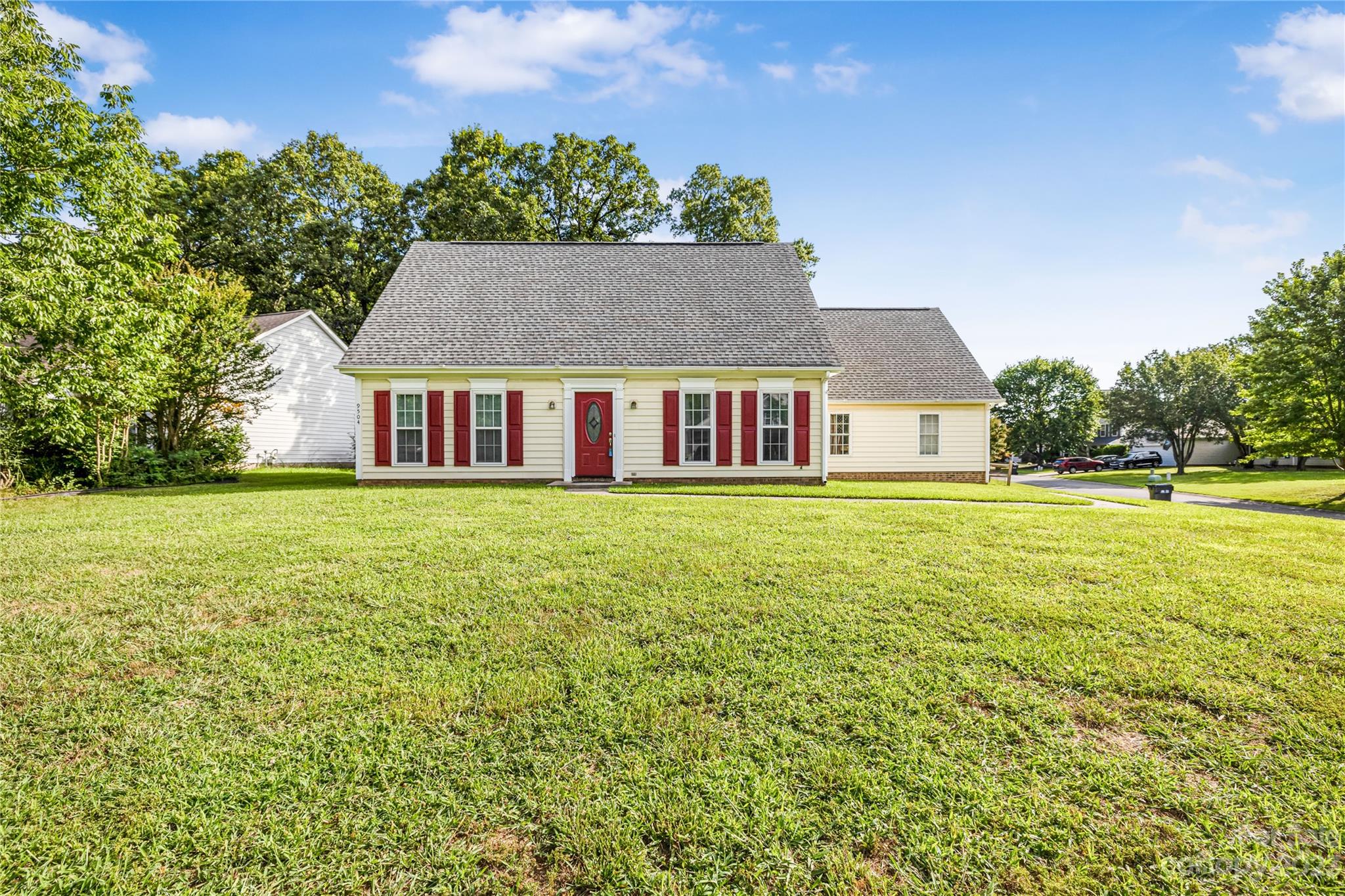 9504 Foggy Meadow Road Charlotte, NC 28269 - Photo 1 of 24 a house view with swimming pool and garden space
