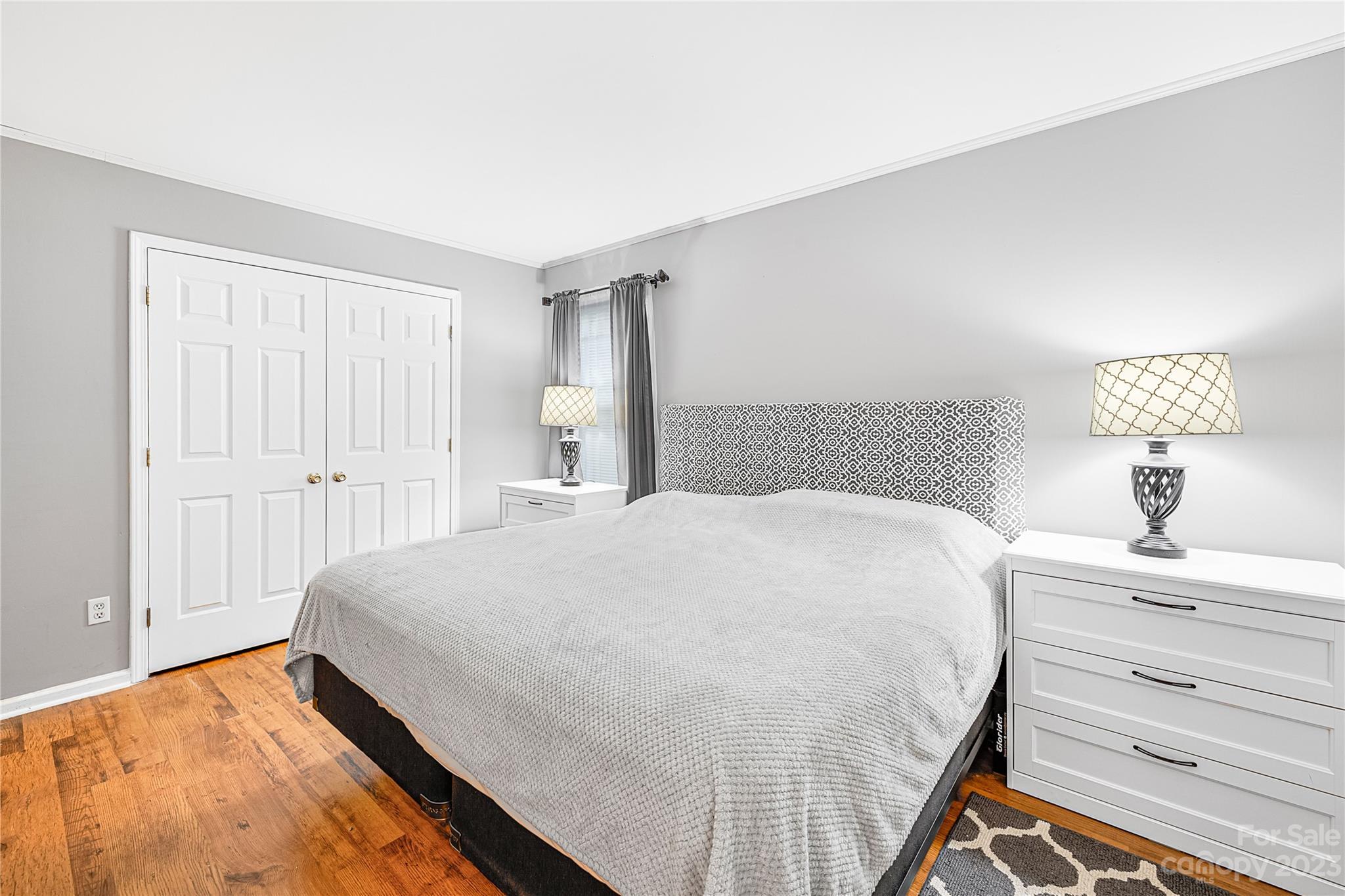 9504 Foggy Meadow Road Charlotte, NC 28269 - Photo 13 of 24 a bedroom with a bed and a window