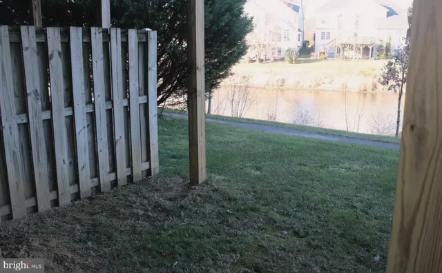 a view of a garden with a building