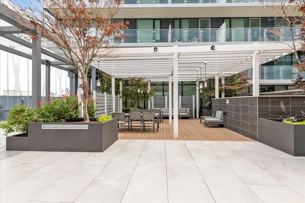 a view of a building with sitting area