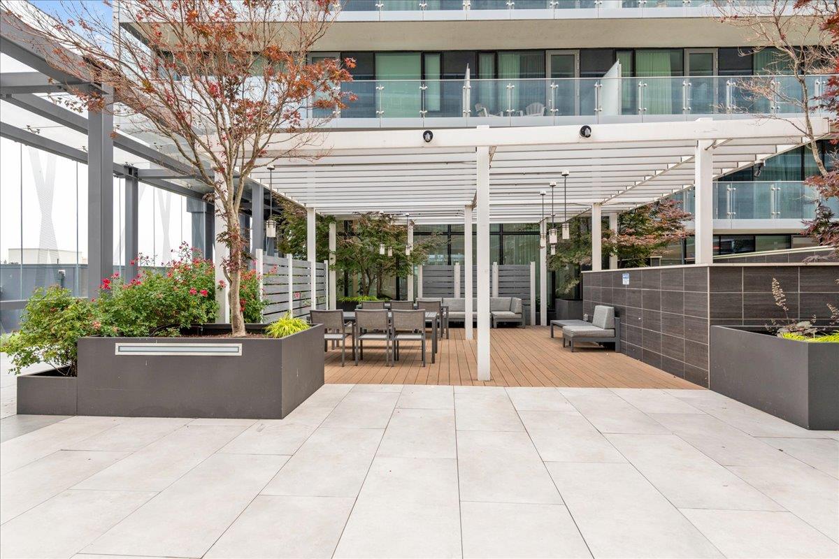 a view of a building with sitting area
