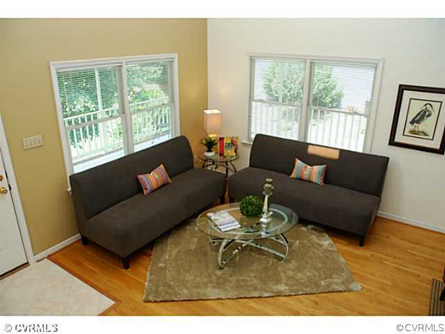 4211 Saratoga Road Richmond, VA 23235 - Photo 4 of 24 a living room with furniture and a window