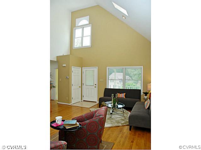 4211 Saratoga Road Richmond, VA 23235 - Photo 5 of 24 a living room with furniture and window