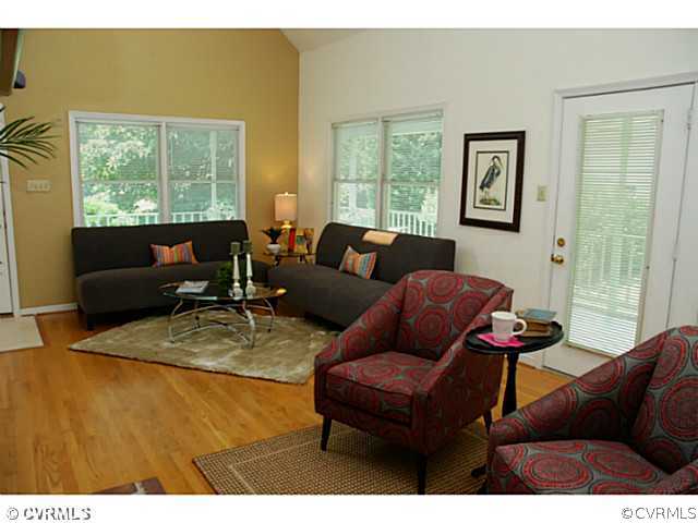 4211 Saratoga Road Richmond, VA 23235 - Photo 6 of 24 a living room with furniture and a large window