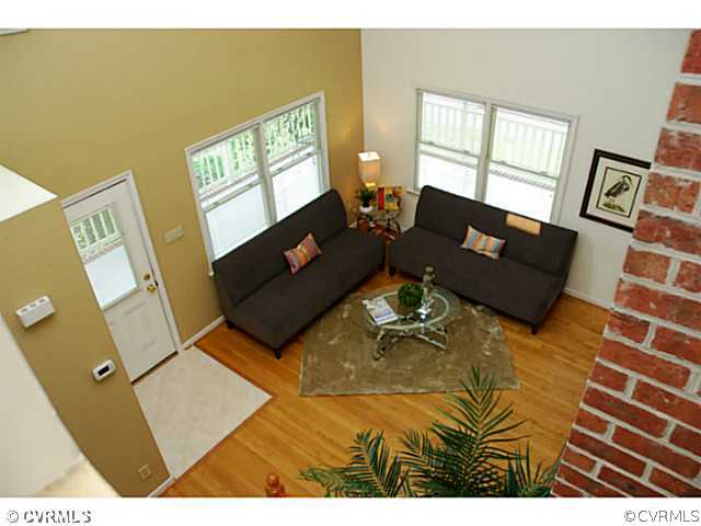 4211 Saratoga Road Richmond, VA 23235 - Photo 7 of 24 a living room with furniture and a window