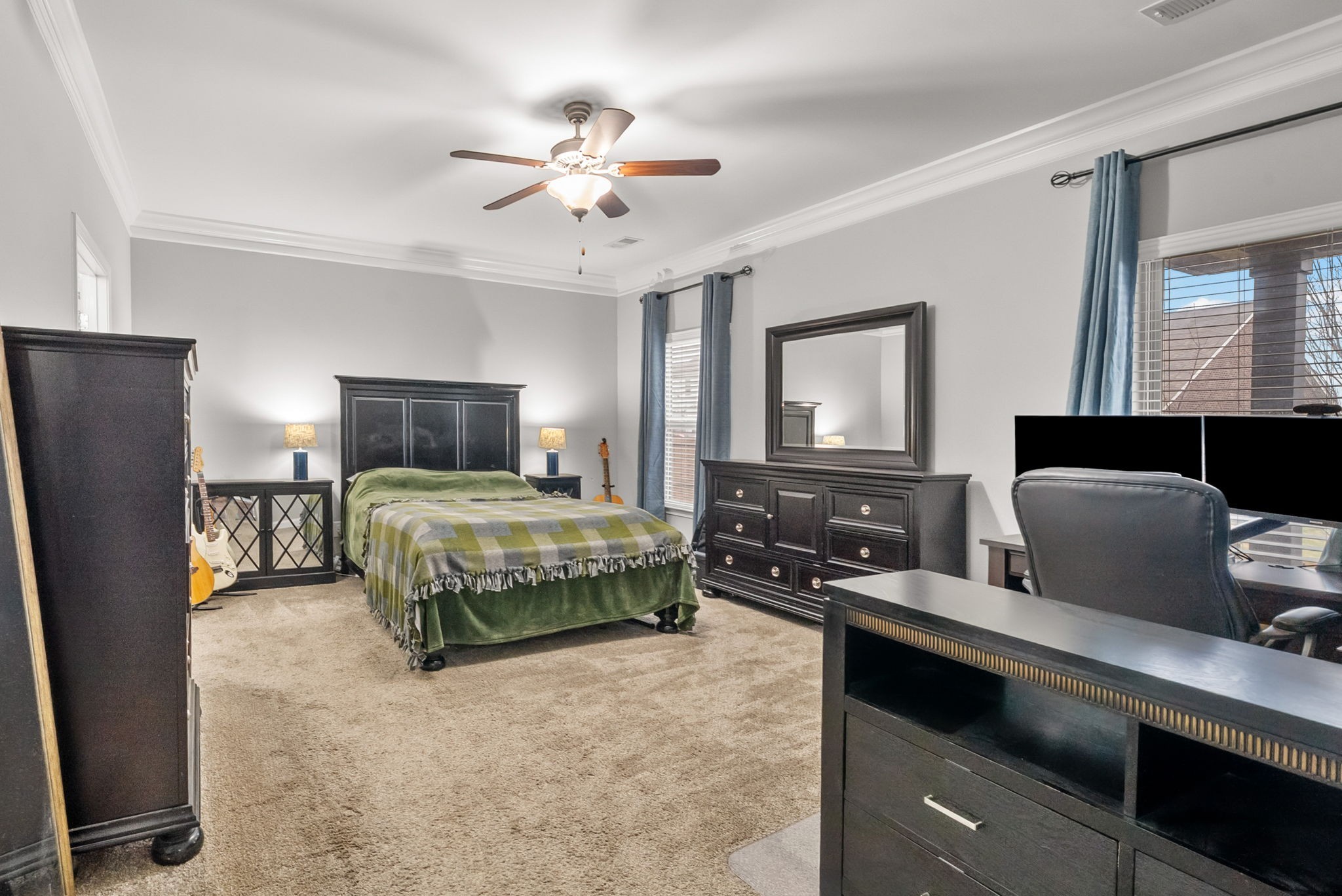 1102 Marys Place Lebanon, TN 37090 - Photo 19 of 58 a bedroom with a bed and a chandelier