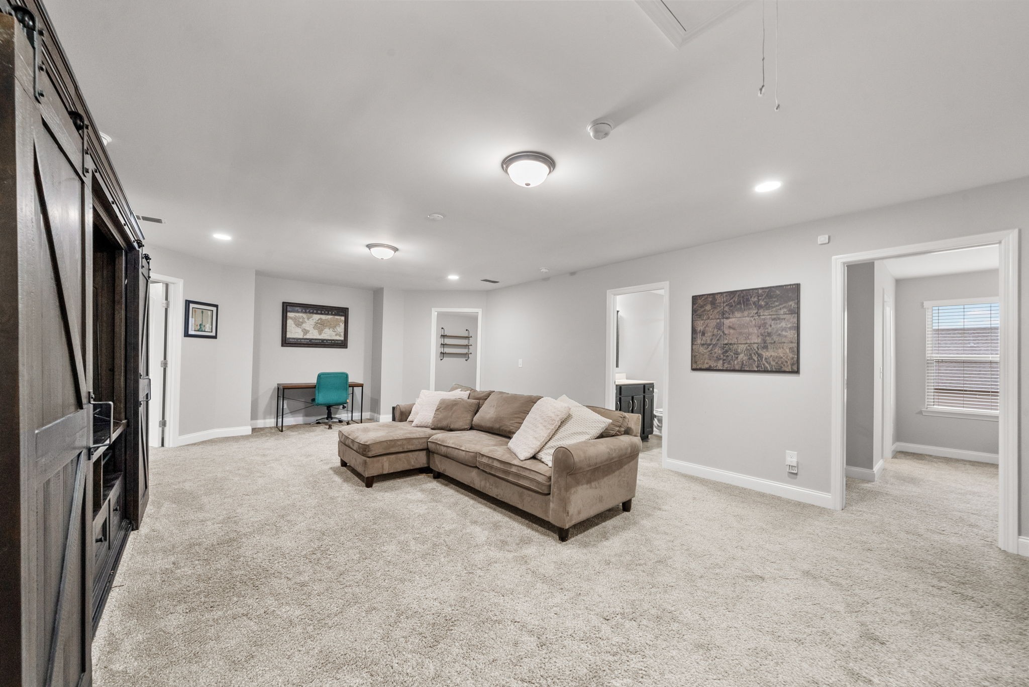 1102 Marys Place Lebanon, TN 37090 - Photo 24 of 58 a living room with furniture and a flat screen tv