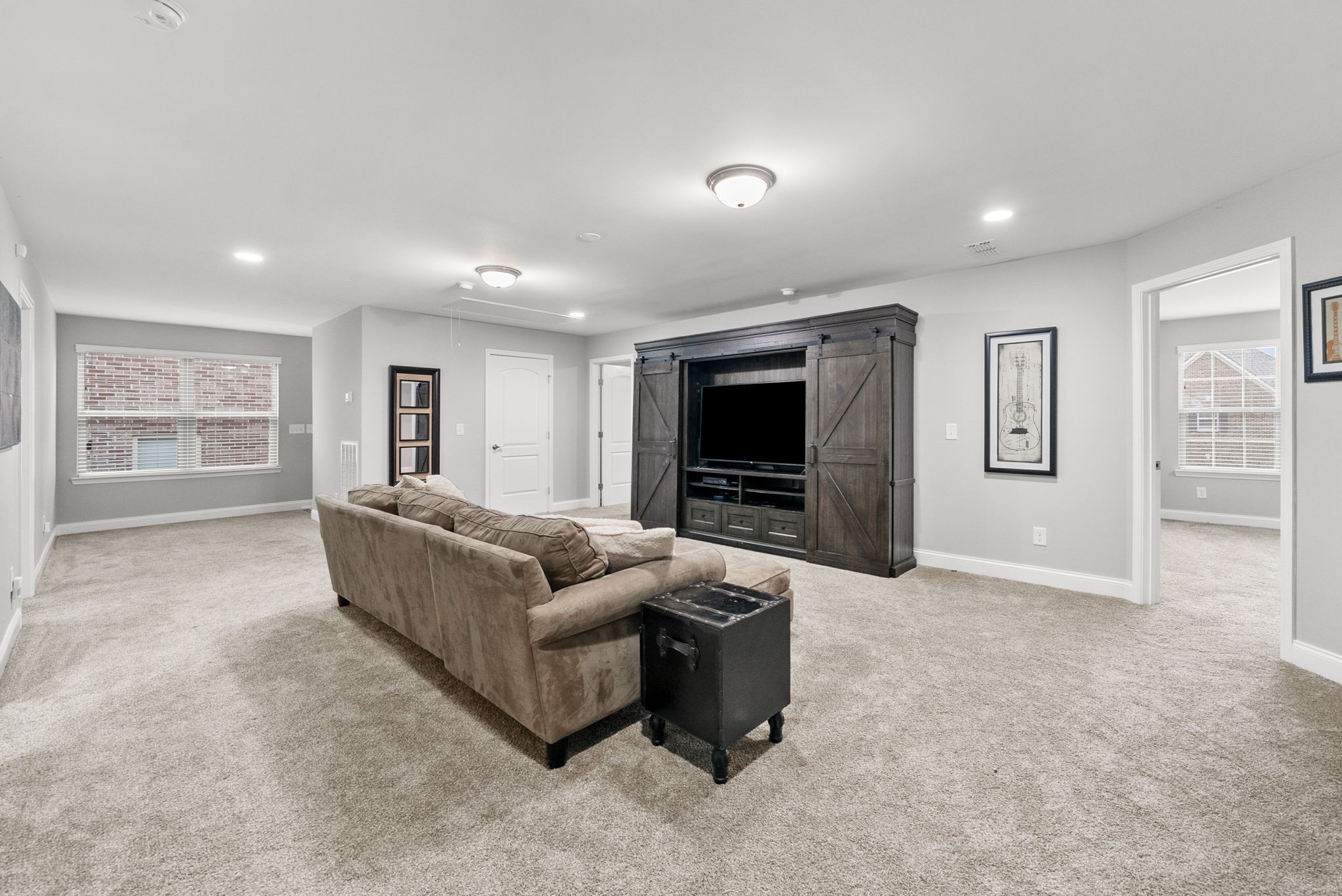 1102 Marys Place Lebanon, TN 37090 - Photo 26 of 58 a living room with furniture and a flat screen tv