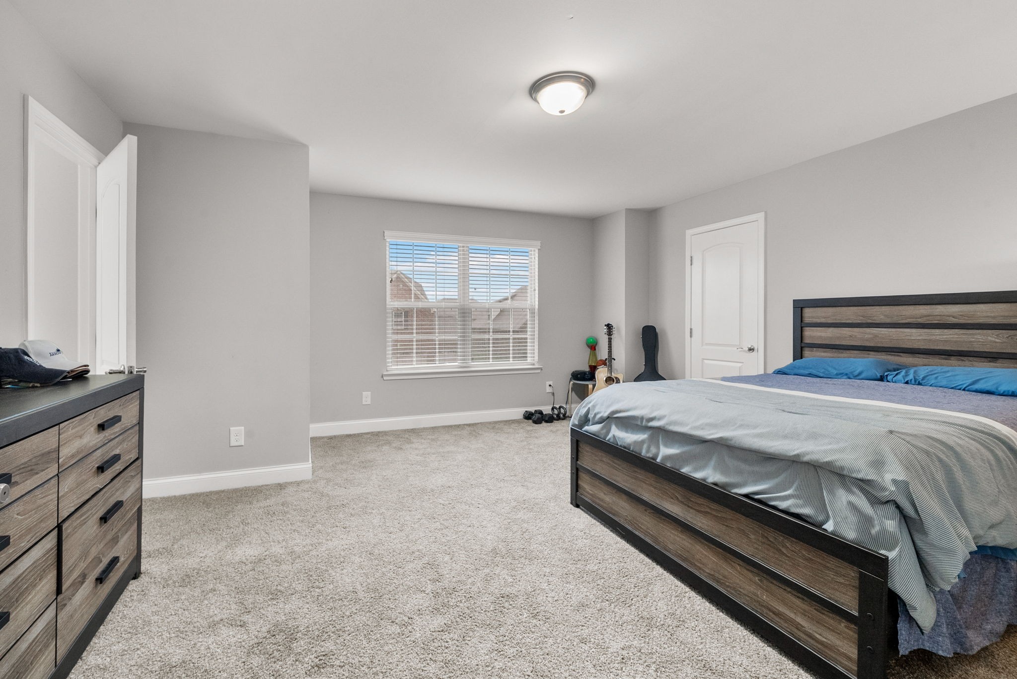 1102 Marys Place Lebanon, TN 37090 - Photo 27 of 58 a spacious bedroom with a bed and a window