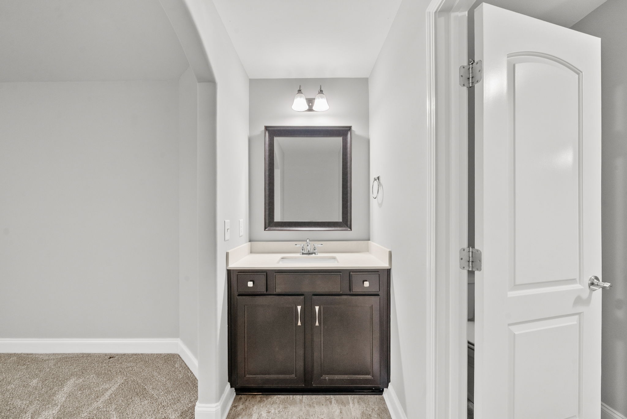1102 Marys Place Lebanon, TN 37090 - Photo 36 of 58 a bathroom with a sink and a mirror