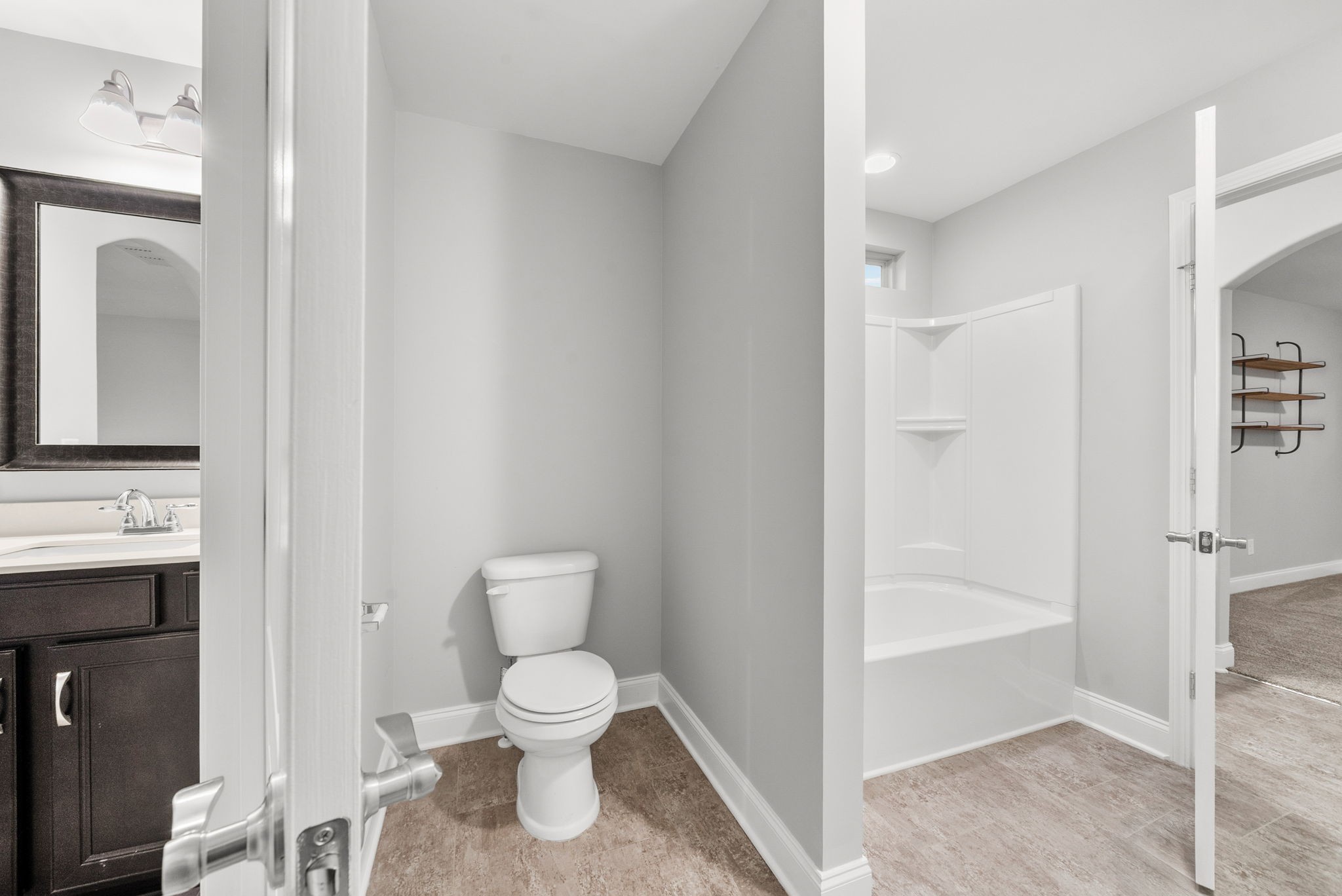1102 Marys Place Lebanon, TN 37090 - Photo 39 of 58 a bathroom with a toilet sink and a mirror