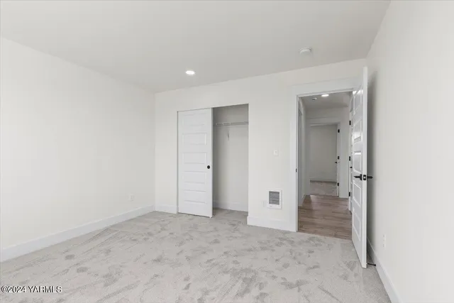 a view of a room with lots of furniture and a projector