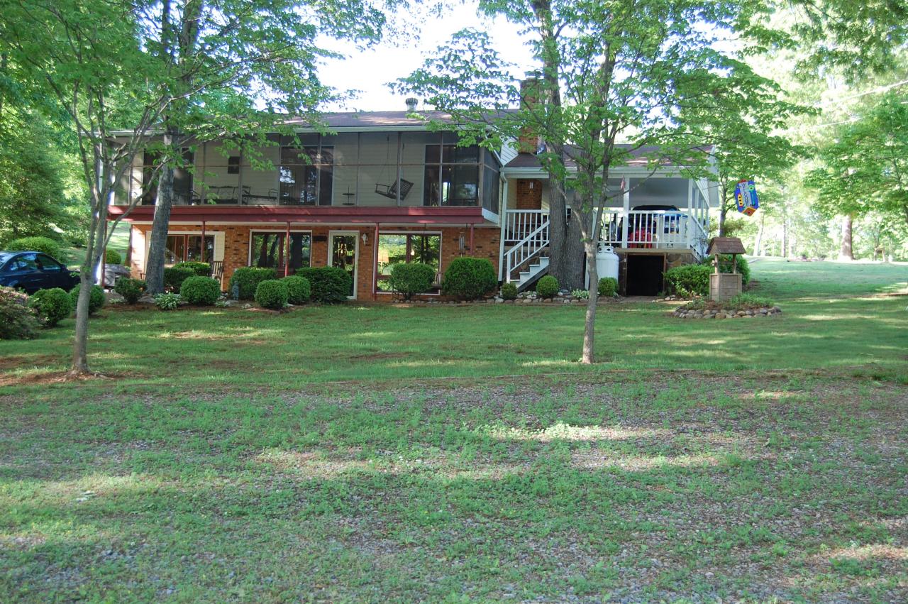 1295 Loggers Road Goodview, VA 24095 - Photo 2 of 6 a view of a house with a yard