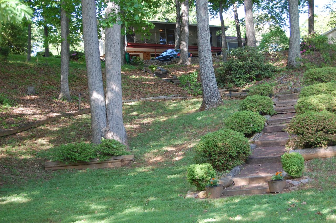 1295 Loggers Road Goodview, VA 24095 - Photo 5 of 6 a view of a bench in a garden