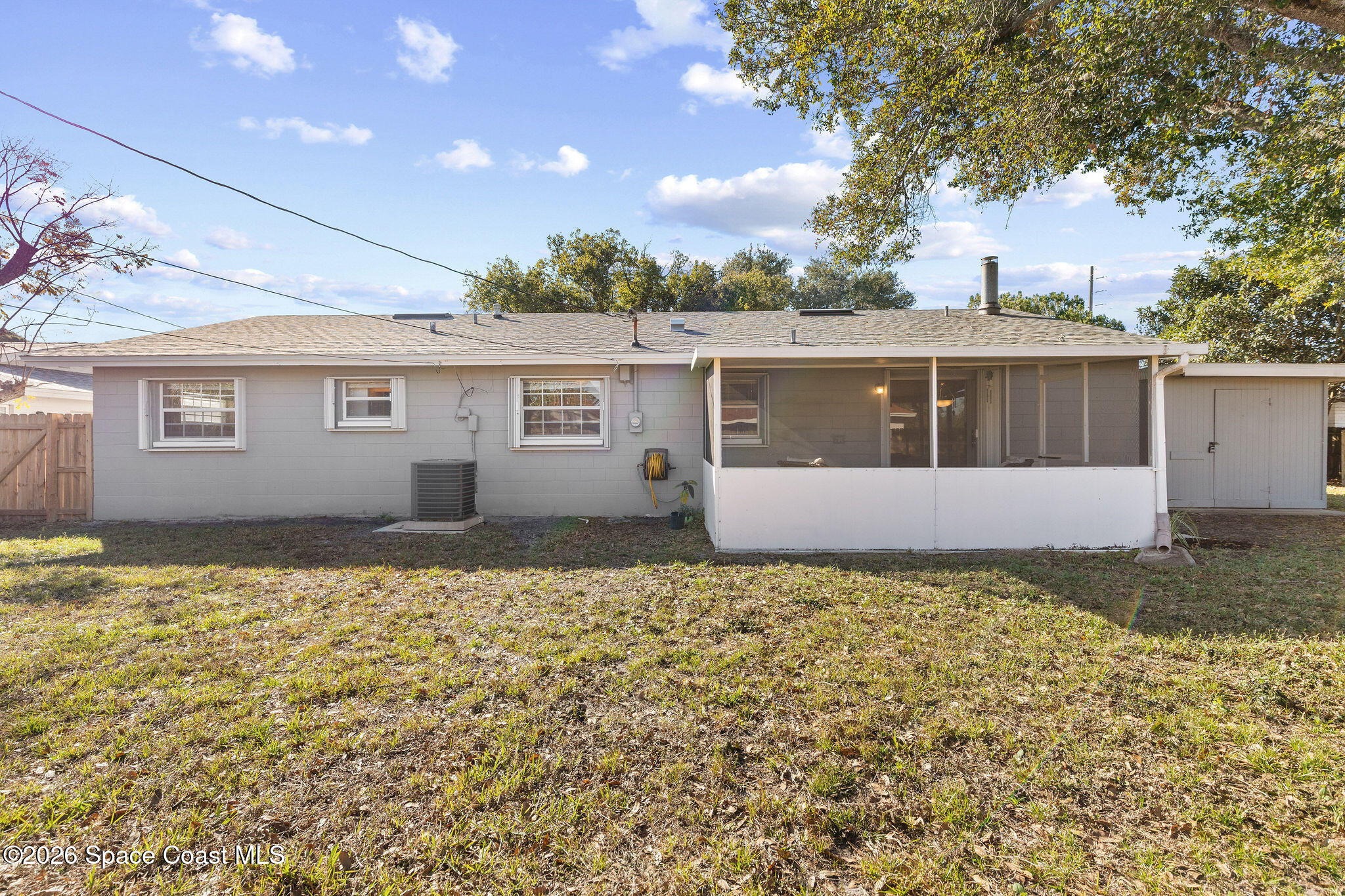 998 Kings Post Road Rockledge, FL 32955 - Photo 35 of 39 a front view of a house with a yard