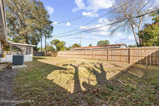 a view of an outdoor space and a yard