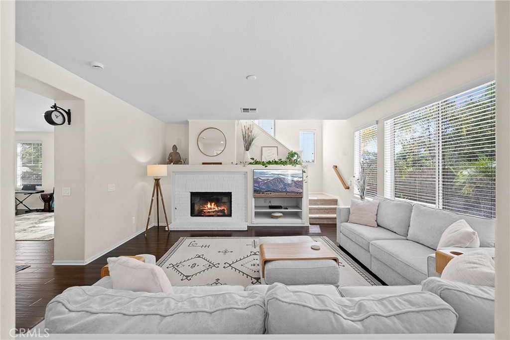 29027 Raintree Lane Saugus, CA 91390 - Photo 13 of 45 a living room with furniture and a fireplace