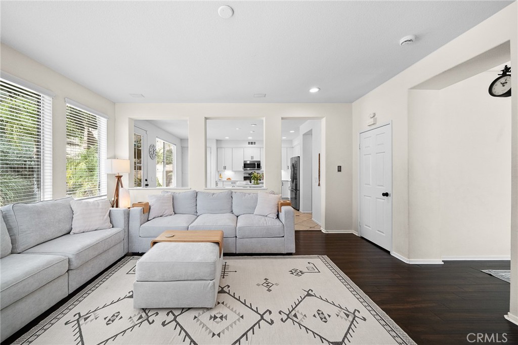29027 Raintree Lane Saugus, CA 91390 - Photo 13 of 44 a living room with furniture and a large window