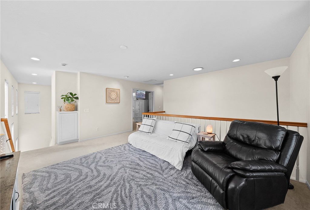 29027 Raintree Lane Saugus, CA 91390 - Photo 23 of 45 a living room with furniture and a couch