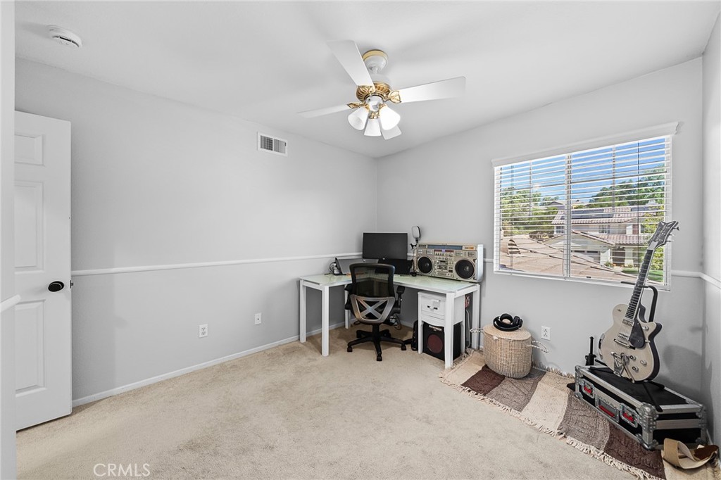 29027 Raintree Lane Saugus, CA 91390 - Photo 33 of 45 a view of a workspace with furniture and a window
