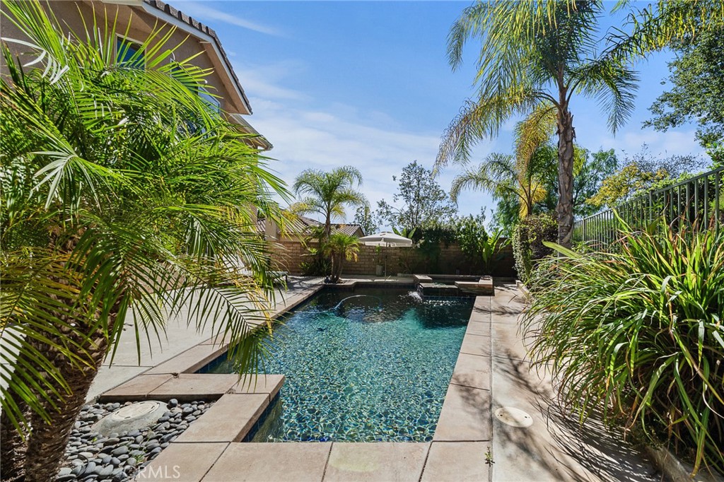 29027 Raintree Lane Saugus, CA 91390 - Photo 38 of 45 a view of a yard with potted plants