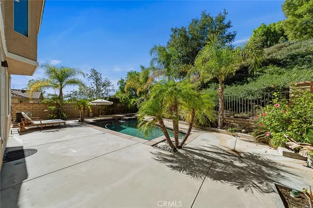 a view of yard with patio