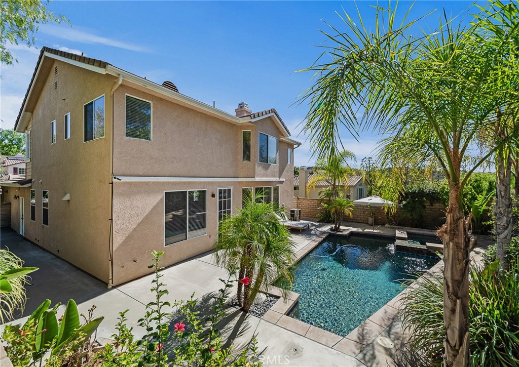 29027 Raintree Lane Saugus, CA 91390 - Photo 42 of 44 a front view of a house with garden