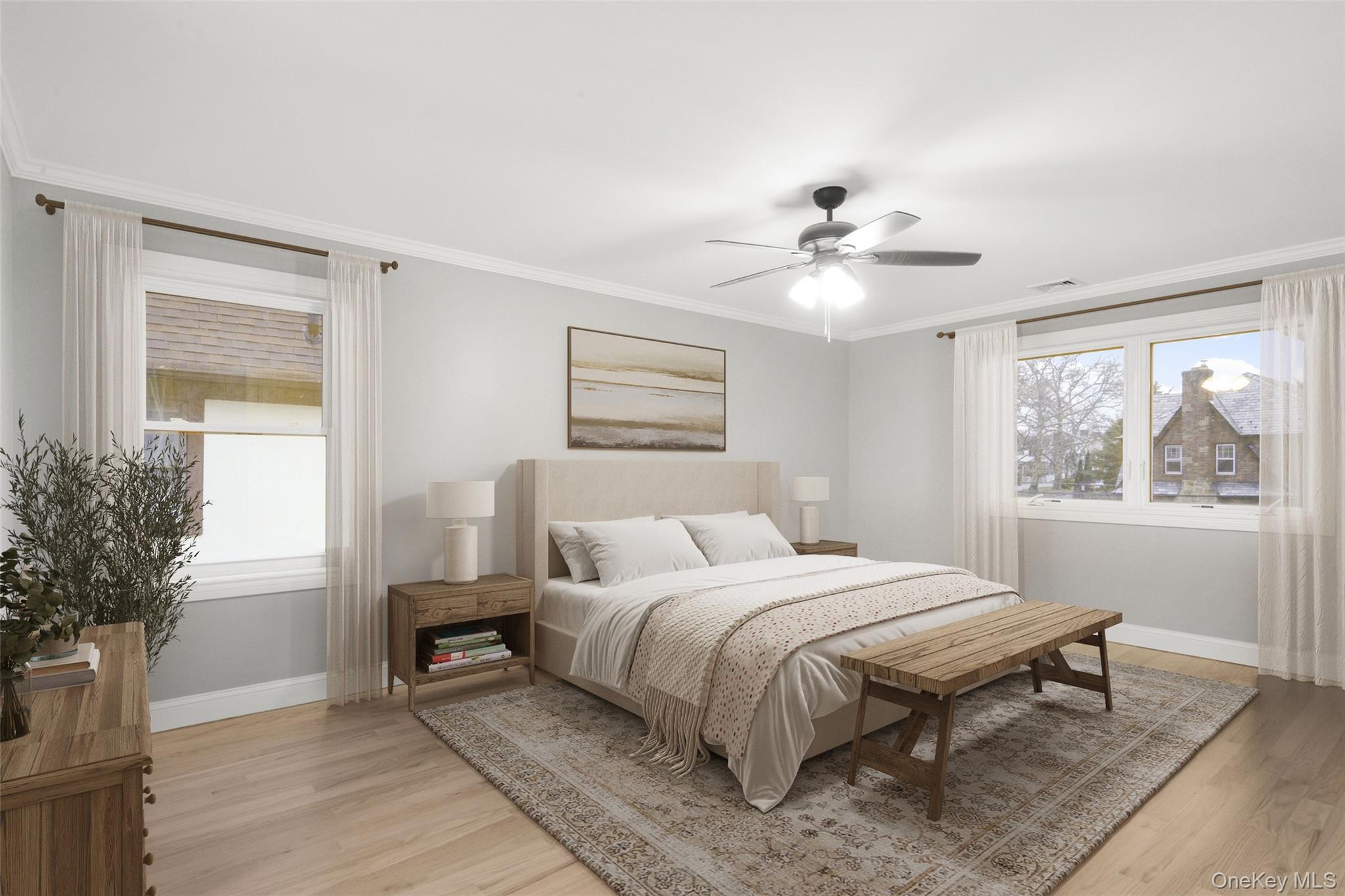 26 Ashton Road Yonkers, NY 10705 - Photo 19 of 33 a bedroom with a large bed and a chandelier