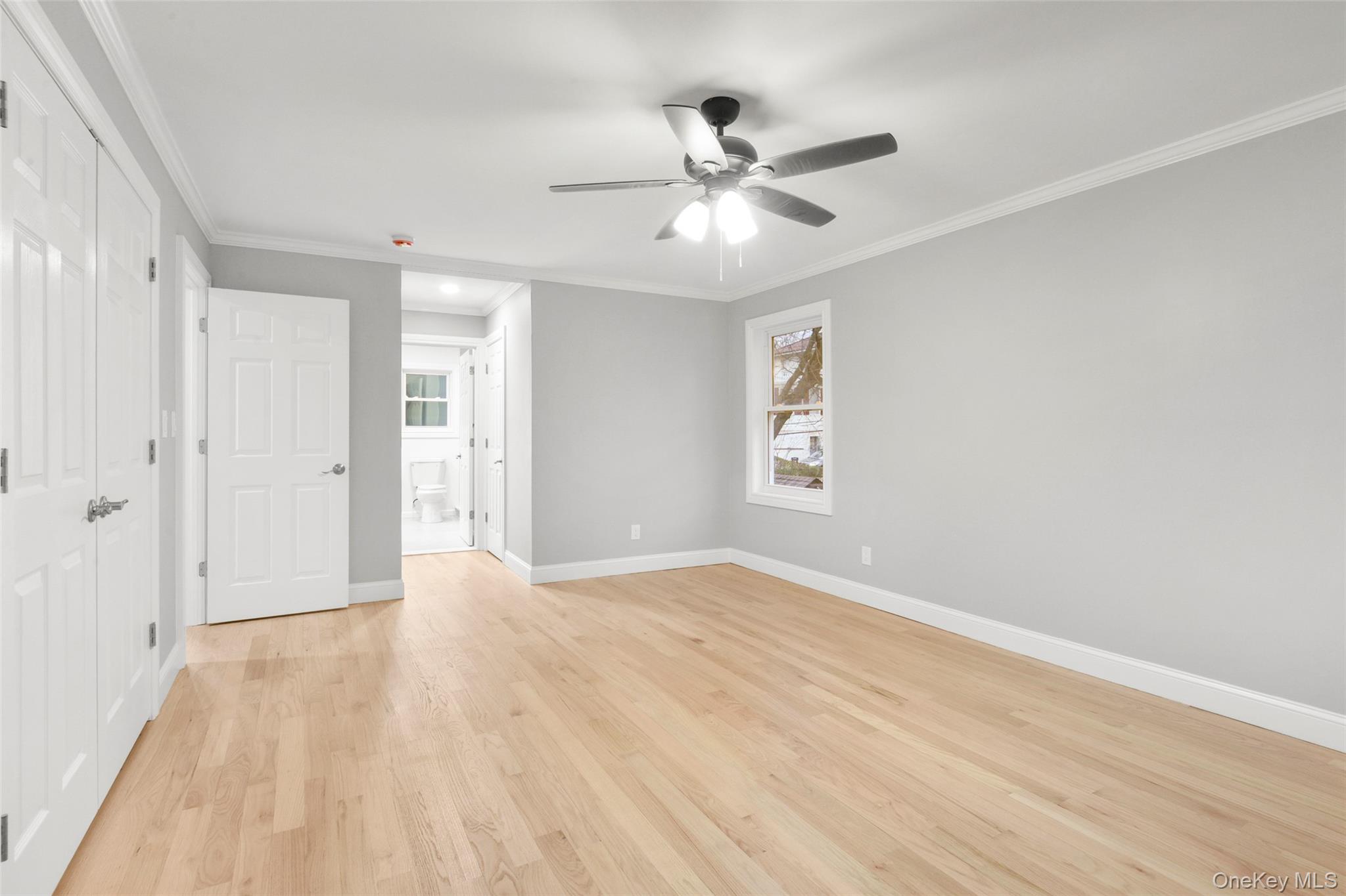 26 Ashton Road Yonkers, NY 10705 - Photo 20 of 33 a view of an empty room with wooden floor and a window