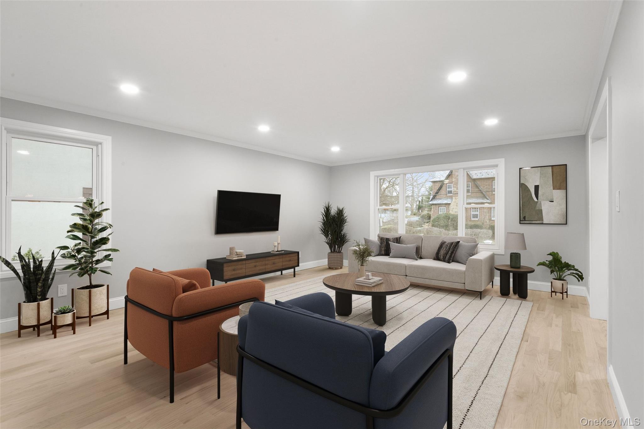 26 Ashton Road Yonkers, NY 10705 - Photo 2 of 33 a living room with furniture and a flat screen tv